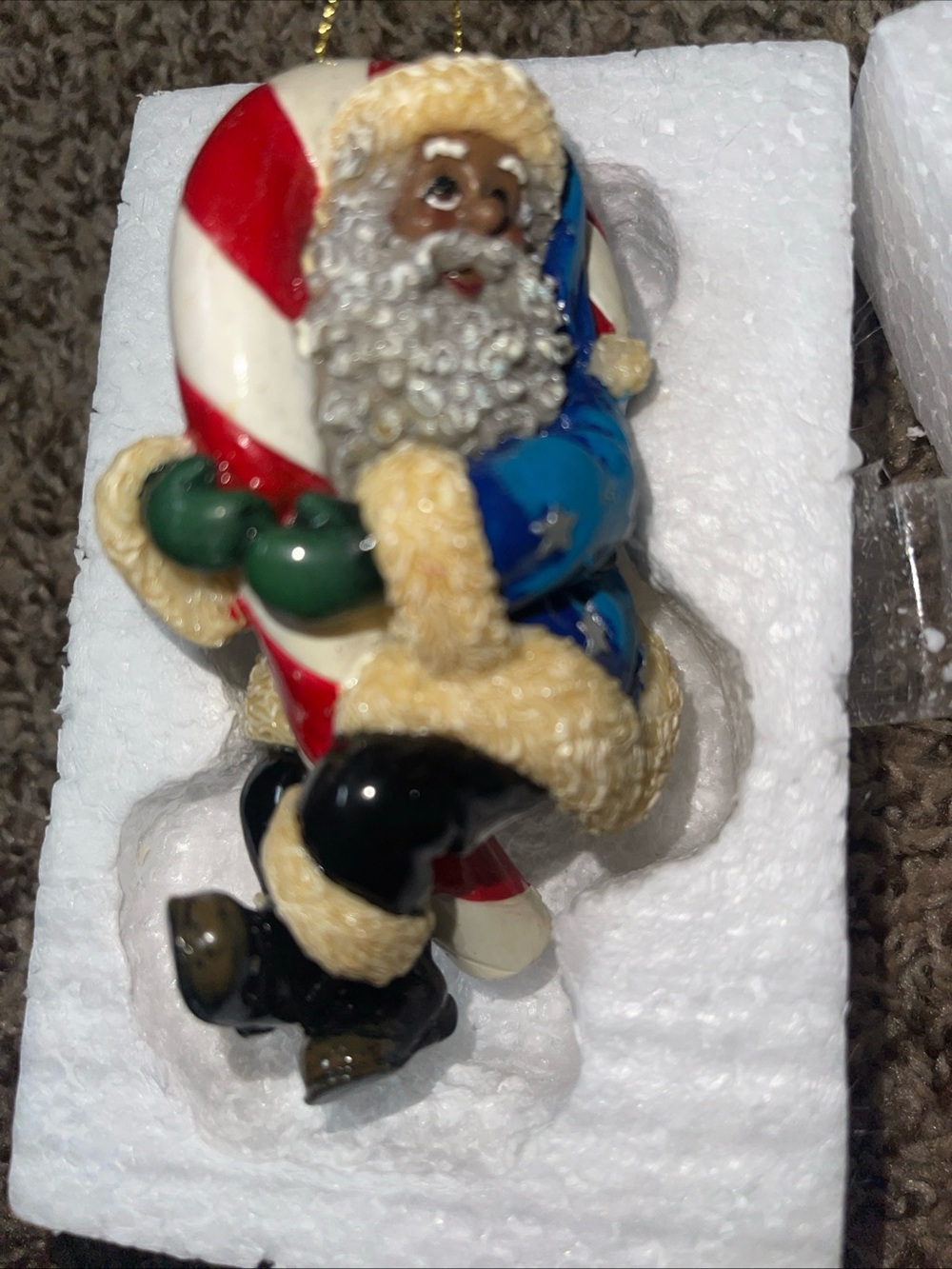 Blue Coat Santa Holding Candy Cane Holiday Ornament